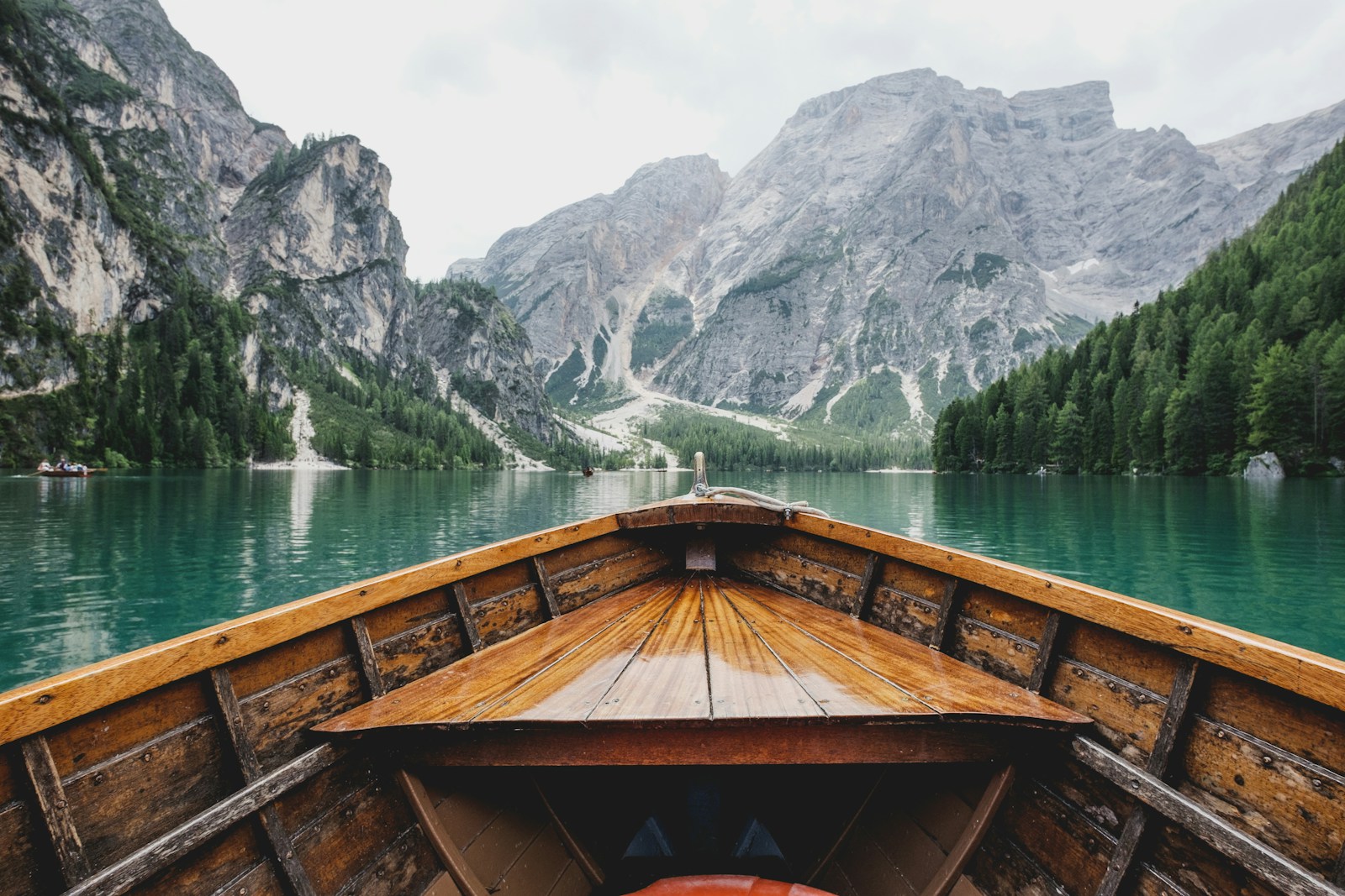 Wooden boathouse beside a mountain lake